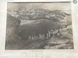 a black and white photo of a group of people on a hill