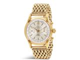 une montre-bracelet pour femme en or jaune 18 carats, dotée d'un cadran blanc