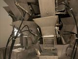 a picture of a machine in a factory with a lot of machines