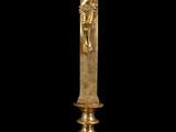 a gold cross with a crucif on top of it