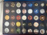 a lot of coins that are sitting on a table