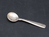 a spoon that is sitting on a table