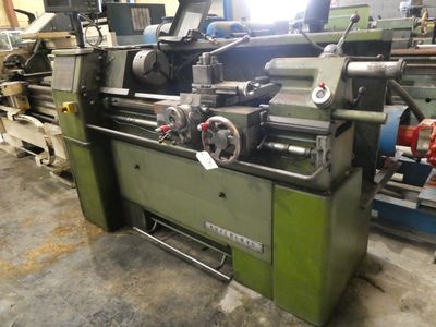 a machine that is sitting inside of a building