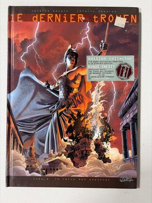 On y voit la couverture de la bande dessinée « La couronne de la sentinelle ».