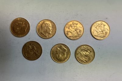 six types de pièces différents sont présentés sur une surface blanche