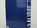 a blue book with white writing on the cover