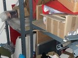 many boxes and boxes on the shelves in the room
