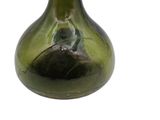 a green glass vase with a black base on a white background