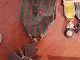 a table with a bunch of medals on it