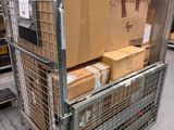 a large metal cart with boxes on top of it