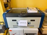 a lot of papers on top of a printer