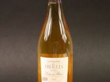 a bottle of wine that is sitting on a table