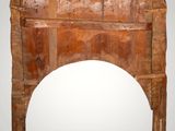 an old wooden arch with a white background and a gray background