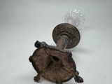 a small turtle that is sitting on top of a table