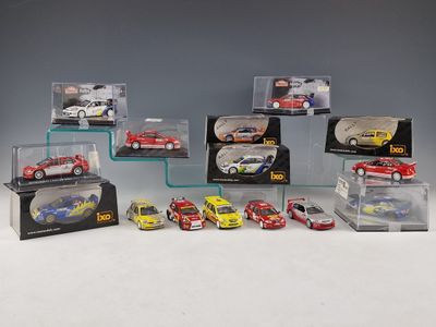 many different models of cars in a display case