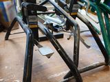 a wooden table with a bunch of bike racks on it
