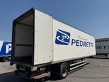 a delivery truck that is parked in a parking lot