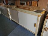 a kitchen with a sink and a stove in it