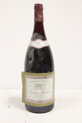 a bottle of wine that is sitting on a table