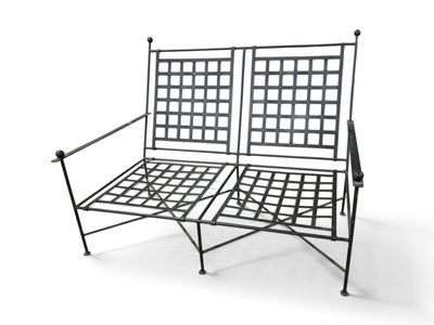 an image of a metal bench with two seats on top of it