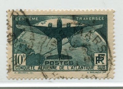 an old stamp with a picture of a plane on it