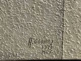 graffiti on the side of a building with a fire hydrant in front of it