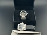 two watches in a black box on a table