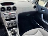 a dashboard of a car with a steering wheel and dashboard controls
