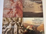 trois livres figurant sur la couverture d'un ouvrage consacré à l'histoire du monde