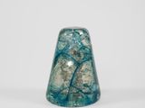 an image of a blue and green glass object on a white surface