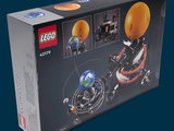 a box of legos with a picture of the earth in it