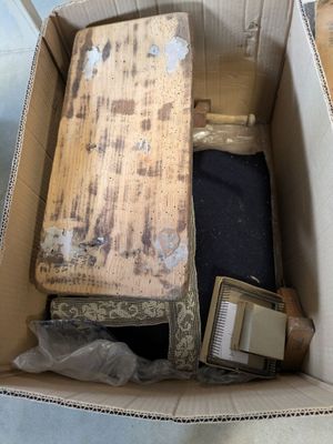 a cardboard box with some items inside of it