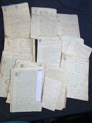 a pile of old papers sitting on a table