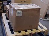 a pallet with a box on it in a warehouse