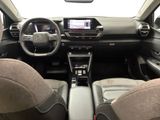 the interior of a car with a steering wheel, dashboard, and dash board