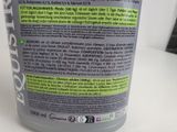a close up of a bottle of shampooe on a table