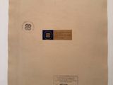 a close up of a piece of paper with a stamp on it