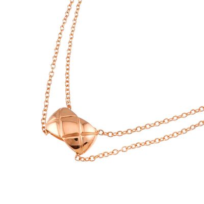 rose gold plated necklace with a heart shaped pendant on a chain