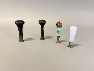 three different types of knobs on a white surface