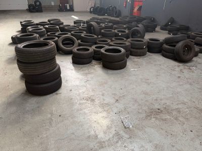 a lot of tires that are on the floor