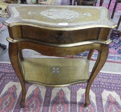 a small table with a drawer on it in a room
