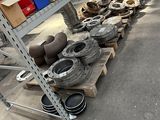 a lot of tires and other items on a shelf