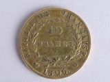 an image of a gold coin with the number twenty on it