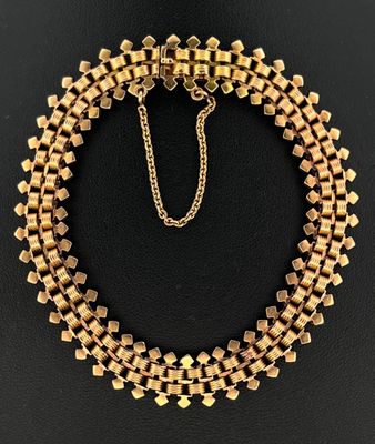 Bracelet en or jaune 750 millièmes à maille fantaisie.
