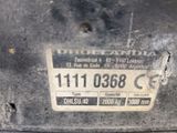 a close up of a metal object with a tag on it