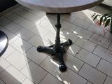 a small table with a book on it in a room