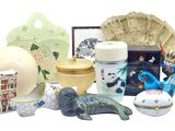 many different items that are sitting on a white surface