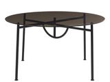 une table noire avec un plateau en verre et des pieds en métal