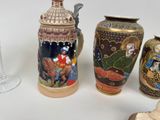 three vases sitting next to each other on a table