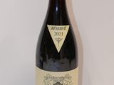 a bottle of wine that is sitting on a table